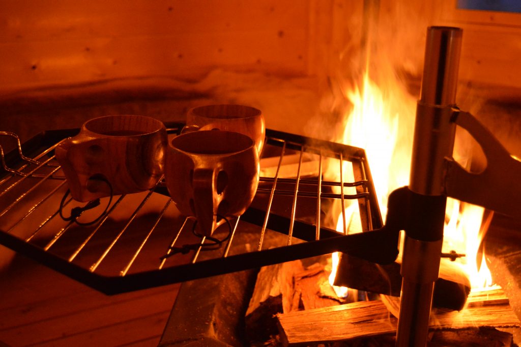 Fire and cups - Reindeer Farm Porohaka, Lapland Finland