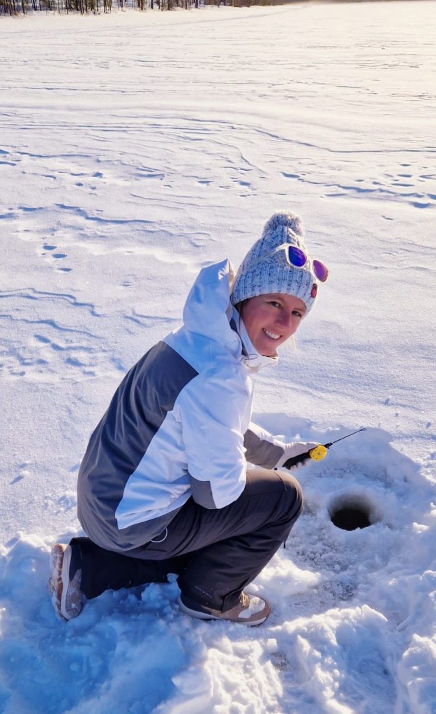 Our guest fishing on the ice in March next to Villa Vasa in Rovaniemi