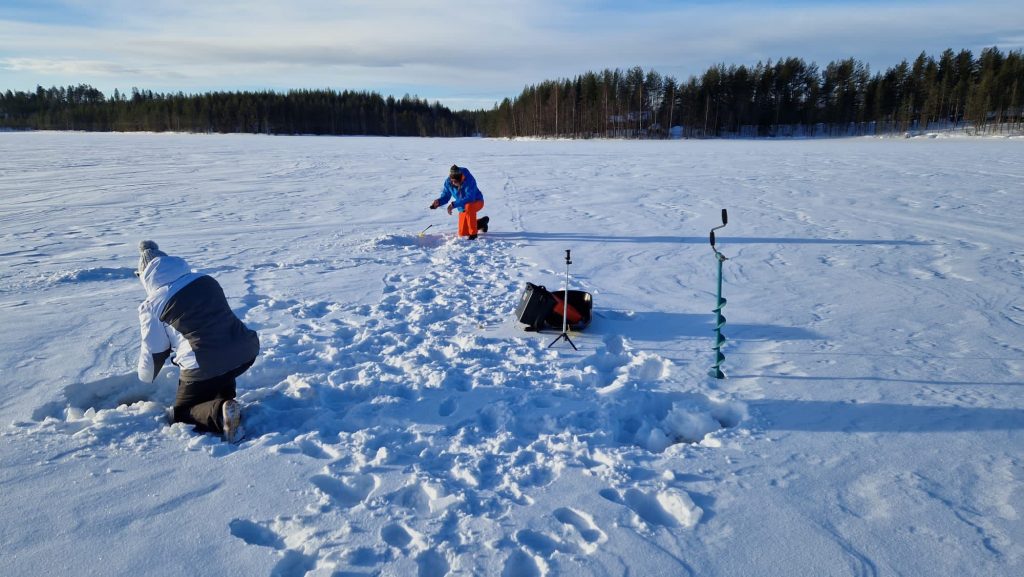Our guest fishing on the ice next to Villa Vasa in Rovaniemi